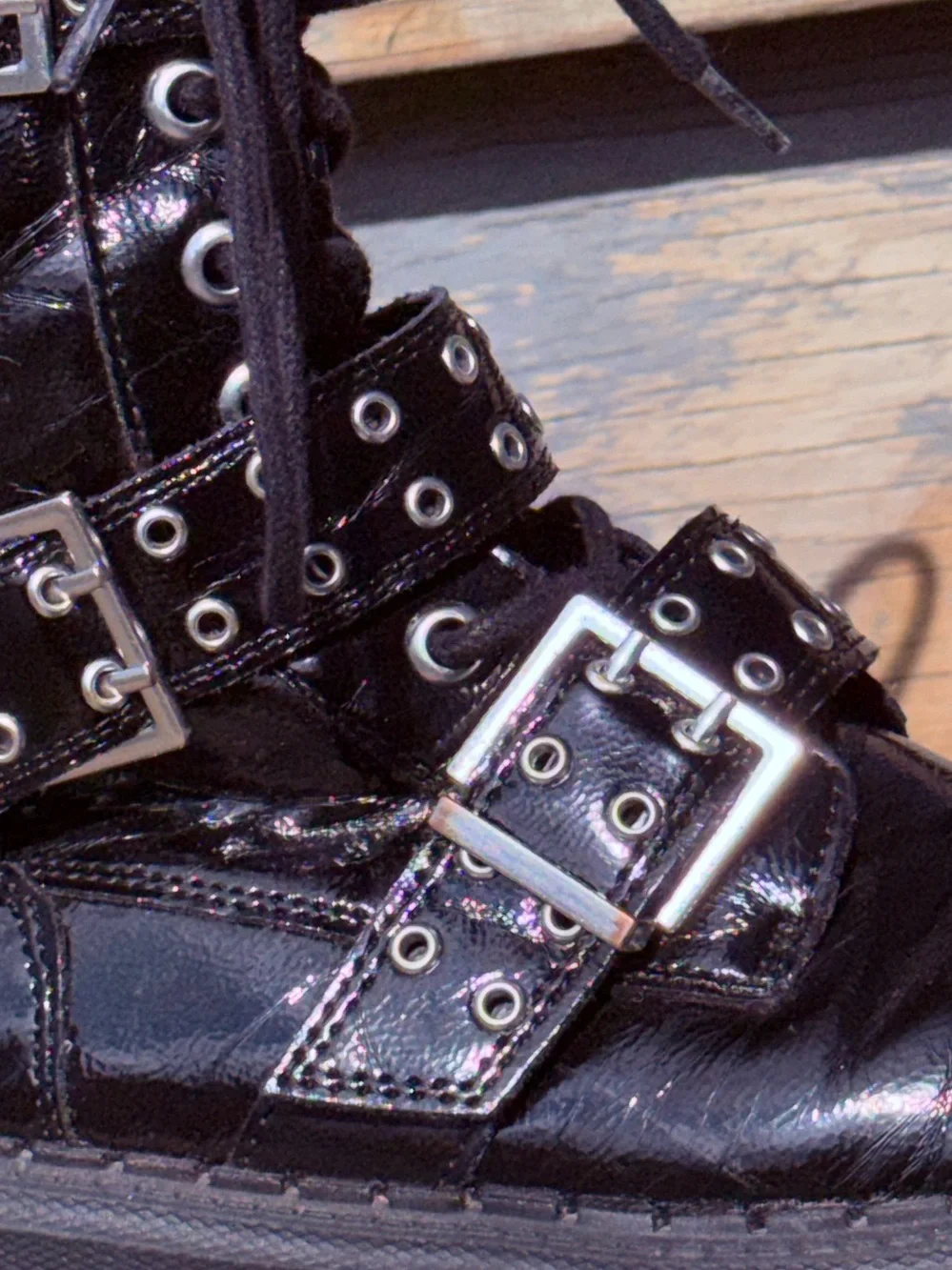 Zara black patent leather buckle combat moto boots, featuring a glossy finish 34